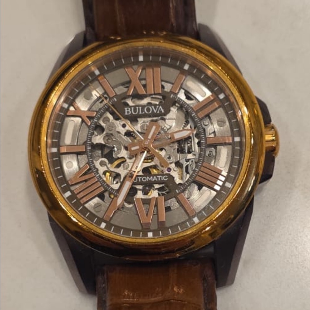 Bulova Gold and Brown Skeleton Dial Watch